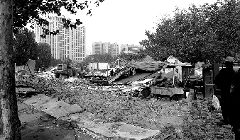 對公園選址的5.5萬多平方米的違章建筑進行拆除。