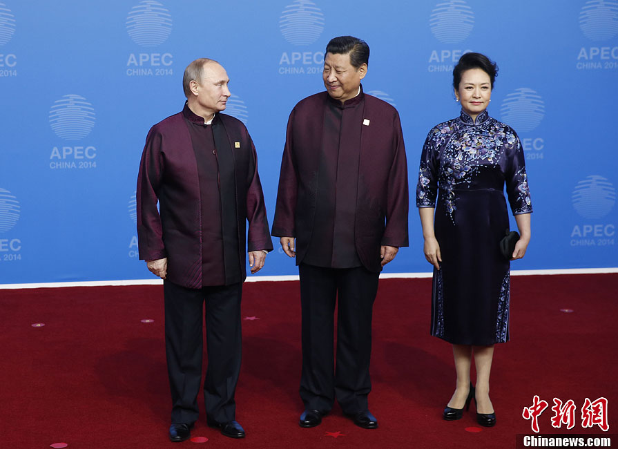 圖為習(xí)近平夫婦歡迎俄羅斯總統(tǒng)普京。中新社發(fā) 杜洋 攝