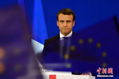圖為馬克龍?jiān)趹c祝集會(huì)上。中新社記者 龍劍武 攝